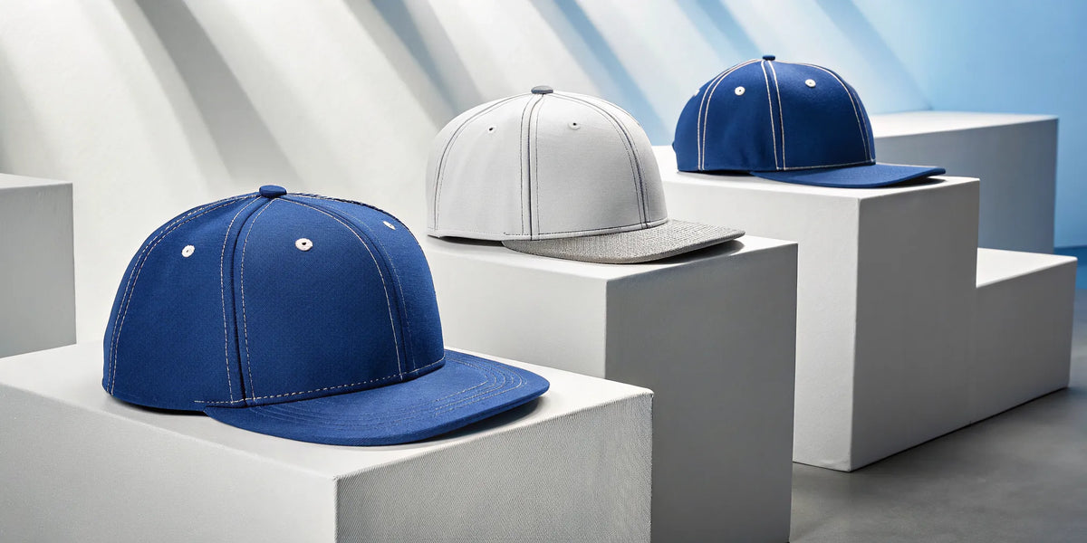 Blue and gray beisbol Dodgers Gallo Fino hats with the signature rooster logo.