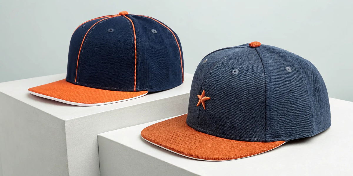 A Barbas beisbol hat and an Astros hat shown side-by-side to compare styles.