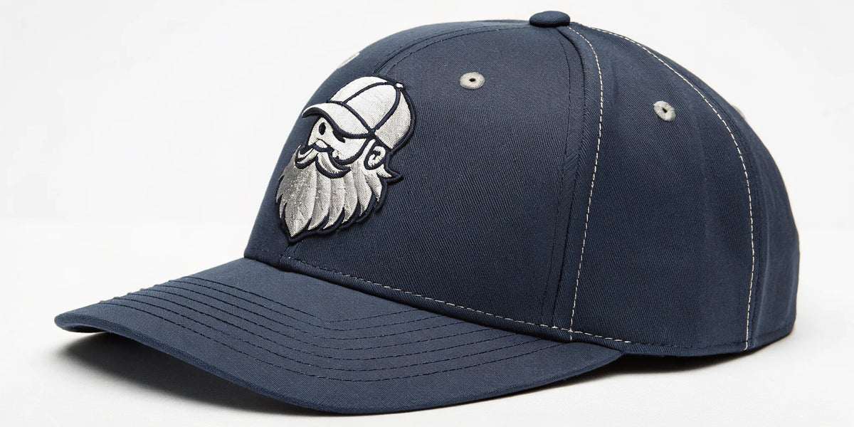 Navy blue Beisbol Barbas embroidered hat with a bearded logo and 5-panel design.