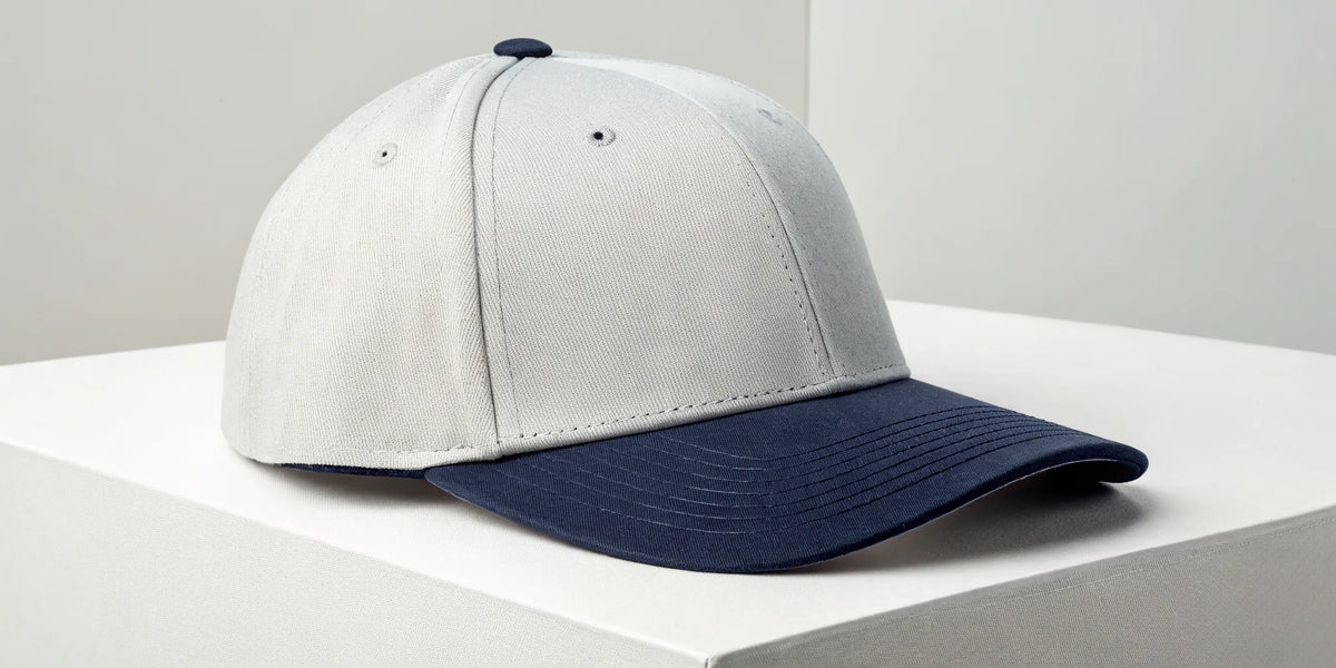 Beisbol Barbas fitted hat in a gray and navy style.