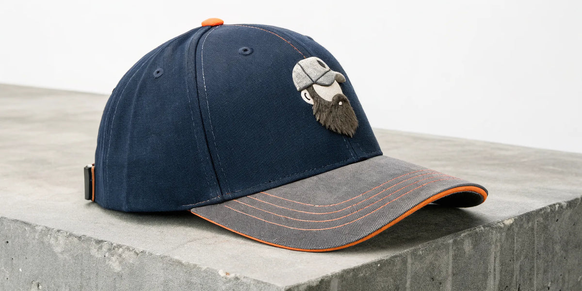 Navy Beisbol Barbas hat with a 3D embroidered bearded logo and orange stitching, a Houston style.