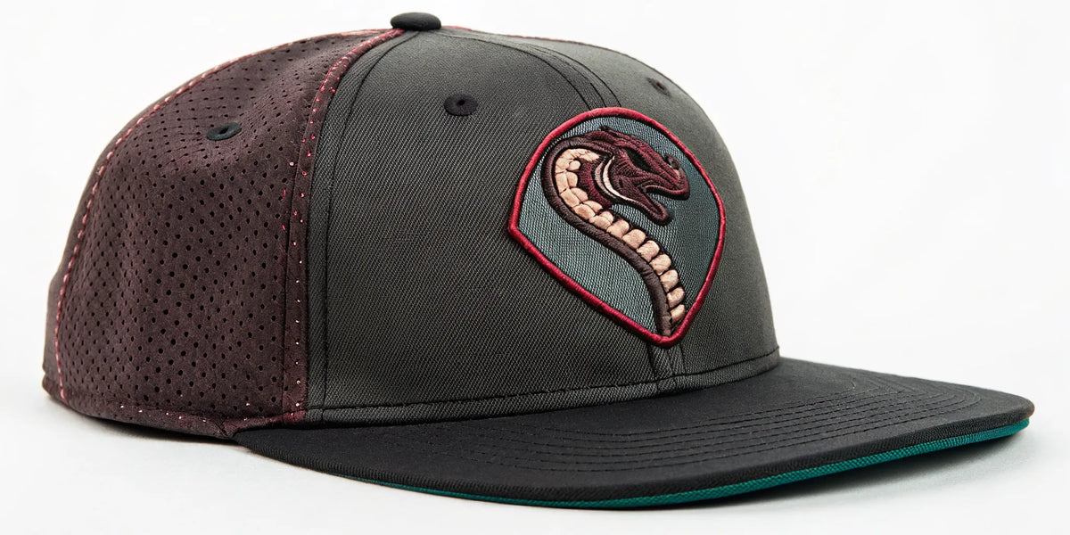 Black and maroon Diamond Backs Barbas beisbol hat with an embroidered snake logo.