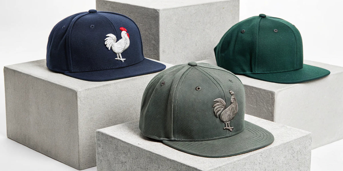 Classic Beisbol Gallo Fino fitted hats with the iconic embroidered rooster logo.